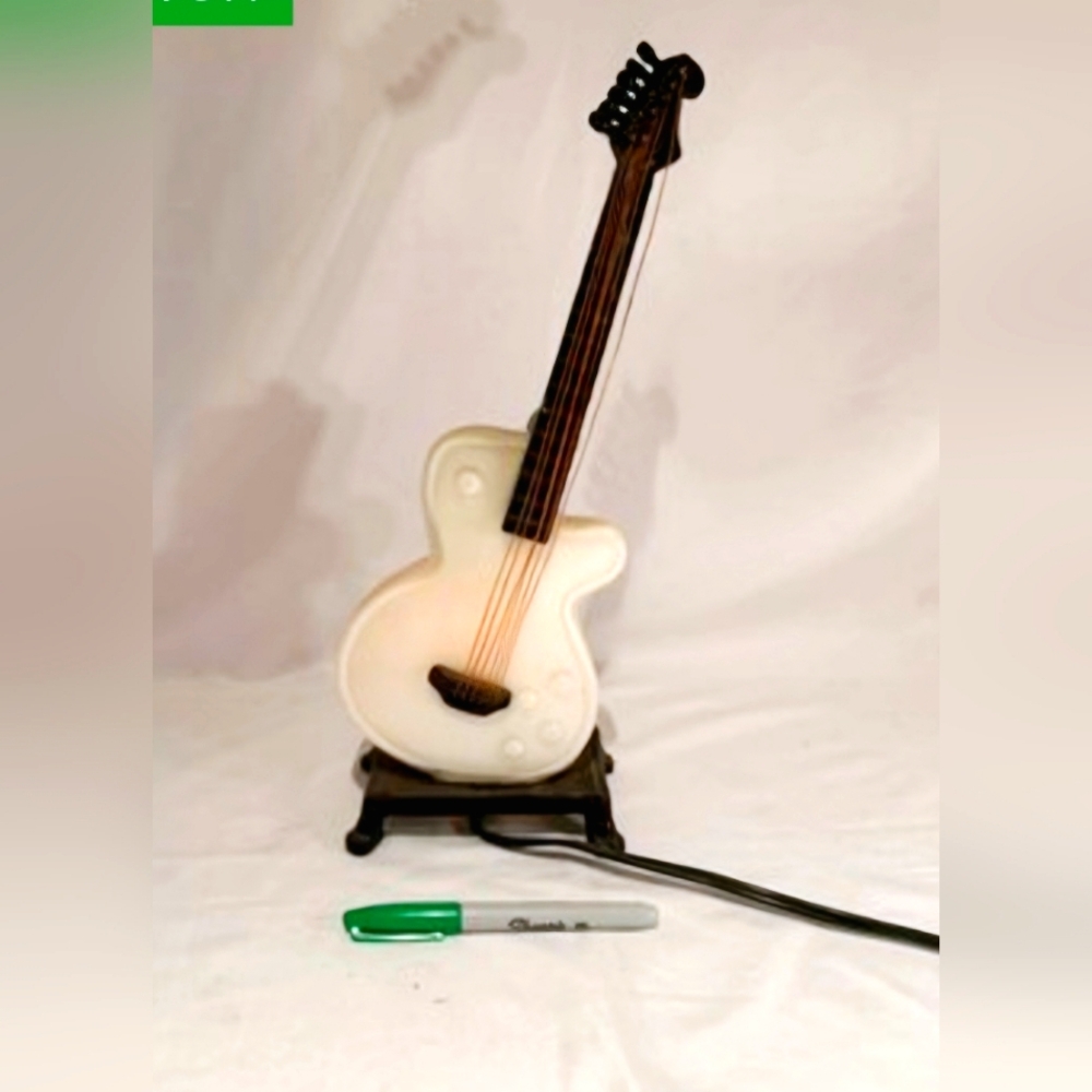 ANTIQUE MILK GLASS AND IRON GUITAR LAMP 18 IN TALL